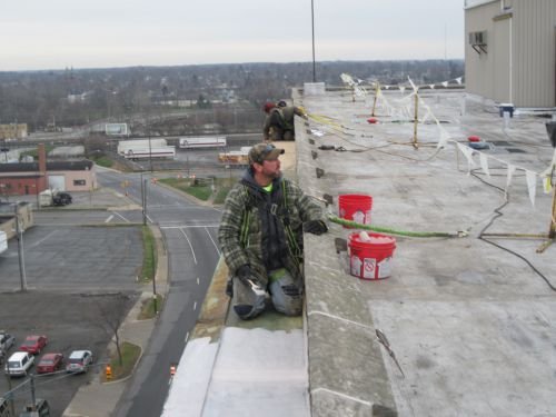 Roofer on a flat roof